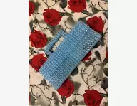 Sac perle fait main.